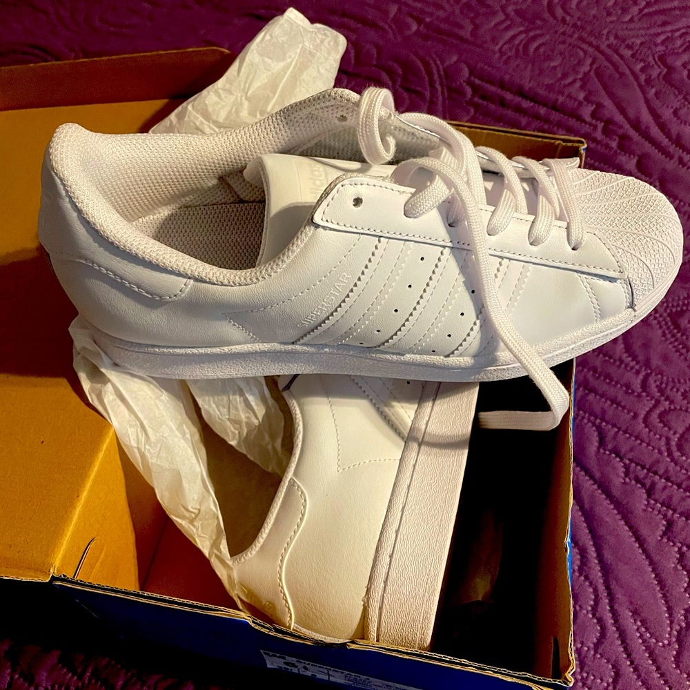 Adidas never worn 6 1/2 boys will fit women’s 8 comfortably